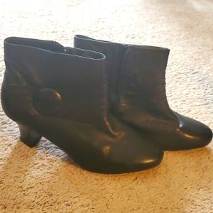 Black leather heeled boots